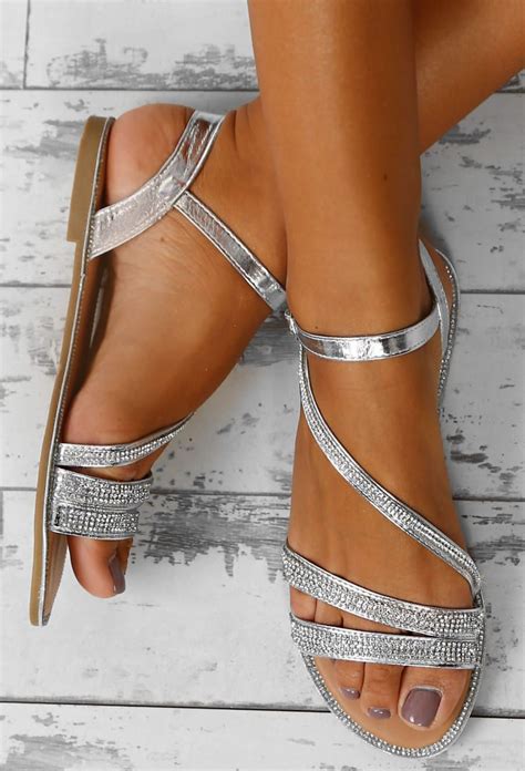 flat silver strappy sandals.